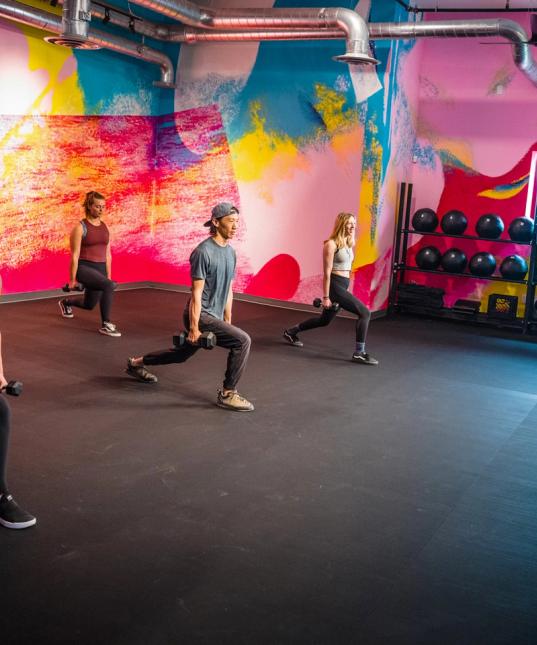 Group of people in a fitness class at evo Salt Lake City